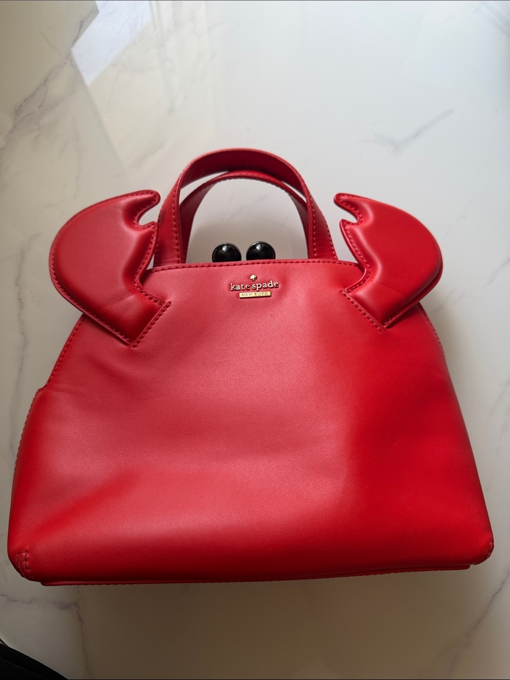 kate spade red crab-claw satchel